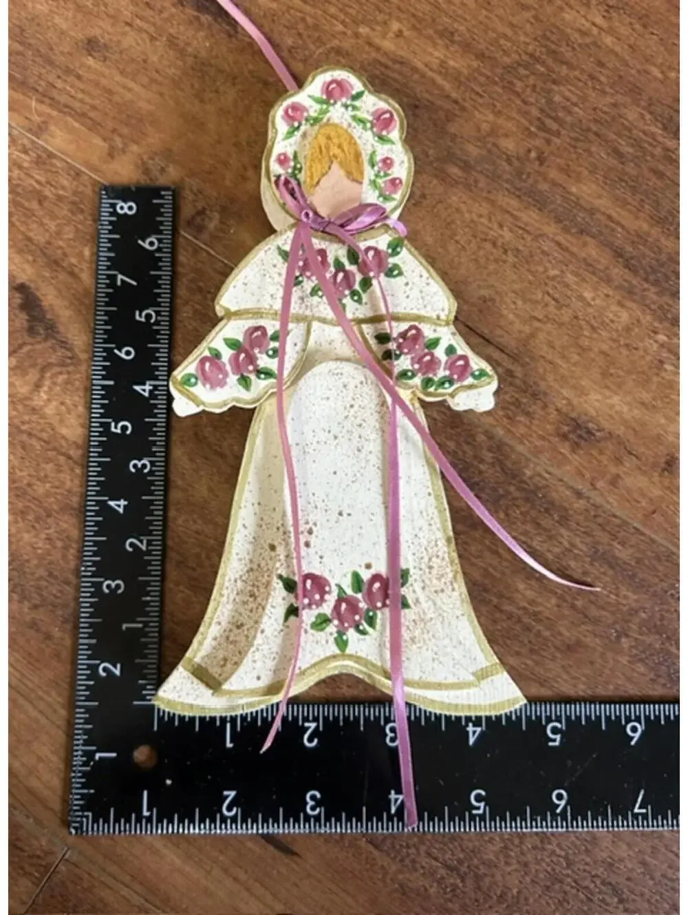 Vintage Wooden Wall Hanging Doll with Floral Design and Pink Ribbon